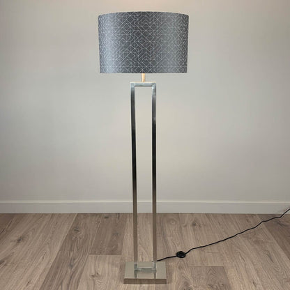 Fitzroy Brushed Steel Floor Lamp with Silver Geo Oval Shade